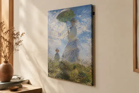 Tableau sur toile représentant une femme au parasol et son fils, reproduction de Claude Monet sur châssis en bois.